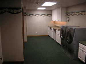 Awesome Laundry Room with sewing desk and craft workstations